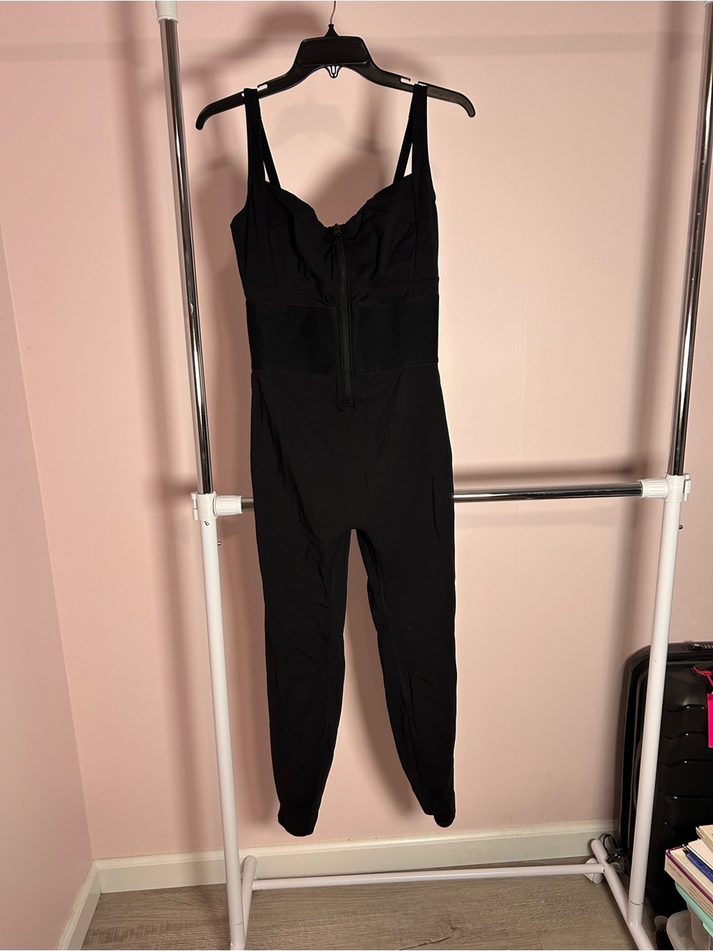 Black Sculpting Jumpsuit with Front Zip and Adjustable Straps